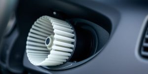 Car blower motor installed in dashboard.